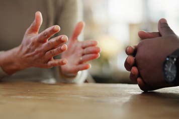 Close up of two people talking